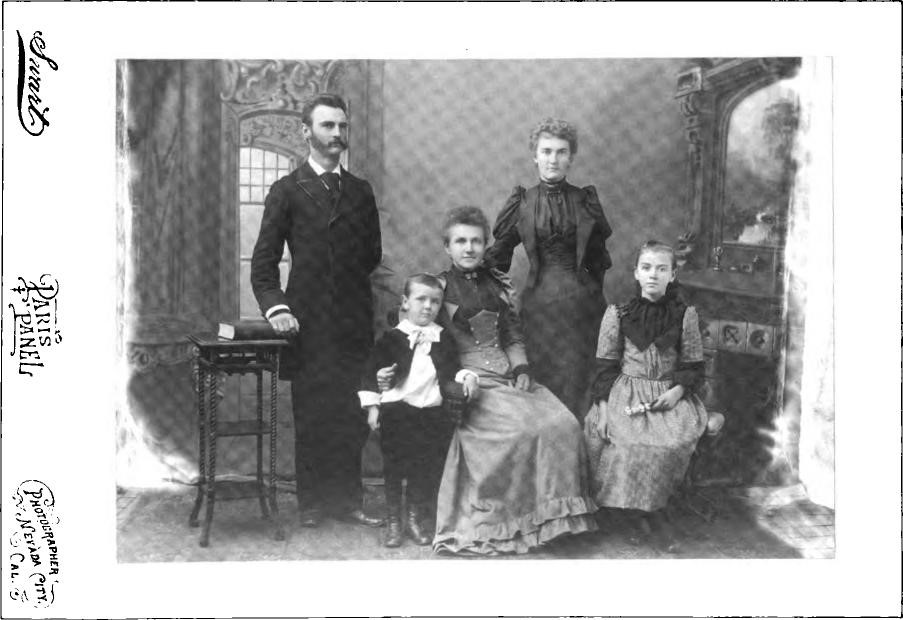 Lottie Meek (seated) with her four children circa 1890-1891 in Nevada City. Left to right: Charles Meek (age 22), Roy Shurtleff (age 3), Jessie Meek (age 19), and Nettie Meek (age 11). This remarkably close-knit family brought joy and comfort to Lottie, and to her mother, Maria Louisa.