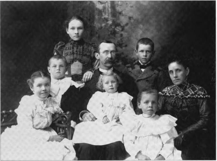 Here in one photograph we find the entire Lawton family. Front Left to right: Hazle, Dorothy, and Helen. Center L-R: Don, father Lawton, and mother Fannie. Top L-R: Winnie and Harry, circa 1897.