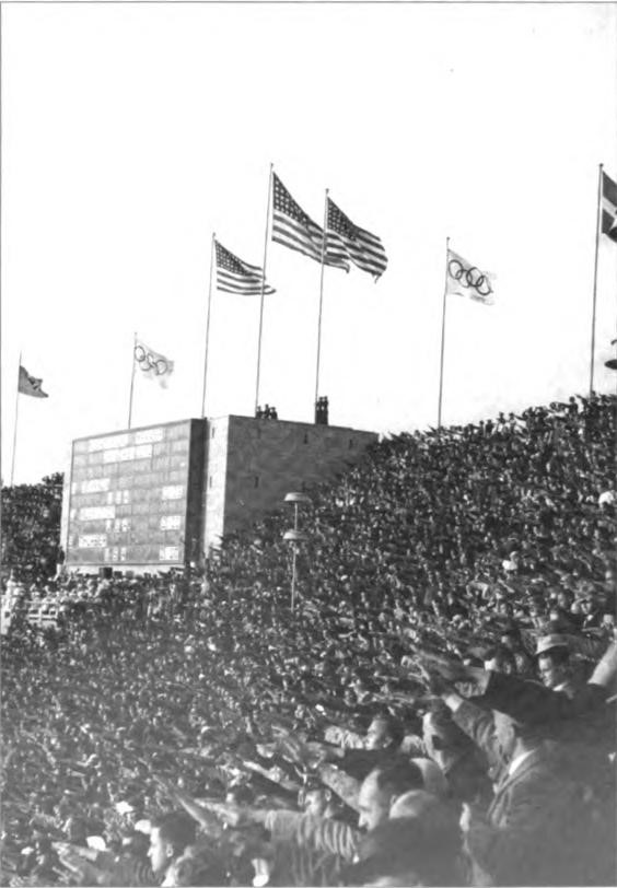 In the 1936 Olympic Games in Berlin, the U.S. swept the high jump: first, Johnson, second, Albritton, third, Thurber. Note the sea of Nazi salutes in the foreground. Photo by Lawton.