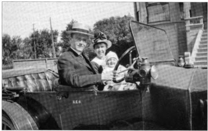 Roy, Hazle, and son Lawton in the car about which Roy wrote to Hazle "a Ford Sedan ain't no tin can."