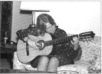 Christie, as with her siblings and cousins, shows her magic on the guitar, circa 1963.