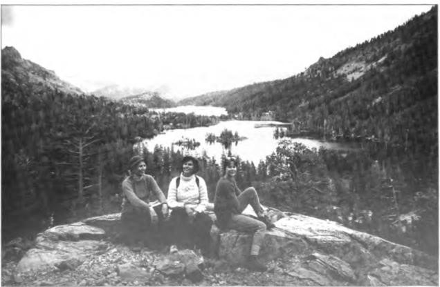 Echo lake, looking east over the smaller upper lake, across the channel, to the much larger lower lake. Three hikers to Desolation Valley, Marti Cowden, Anneke, and Gail Kefauver, circa 1990.