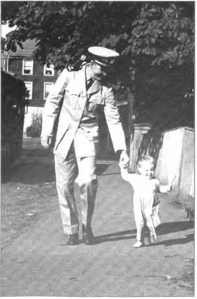 Ensign Shurtleff and young heir apparent, William Roy Shurtleff, Marblehead, 1942.