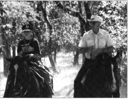 Lawton and oldest grandson, Justin, enjoying Chalk Hill Ranch, circa 1995.
