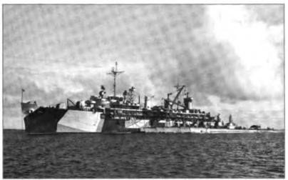 The U.S.S. Sperry, submarine tender with subs alongside, at Majuro, a tiny atoll in the Marshall Islands, 1944.