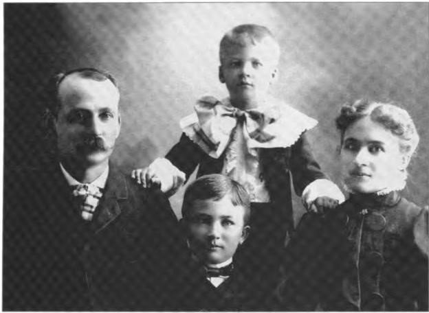Frank and Ida Reanier and their two sons, Elster (front), and Wilber, circa 1879, at their home in Santa Cruz, California, when Elster was about 7 and Wilber about 5.