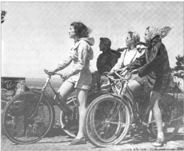 Betty and Jean Lawton (far right) bicycling with friends on Orcas Island in 1940.