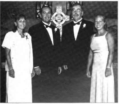 The McAdams family. Left to right: Lynn, Christopher, Greg, 
and Dana. Christopher's wedding, 5 August 2000.
