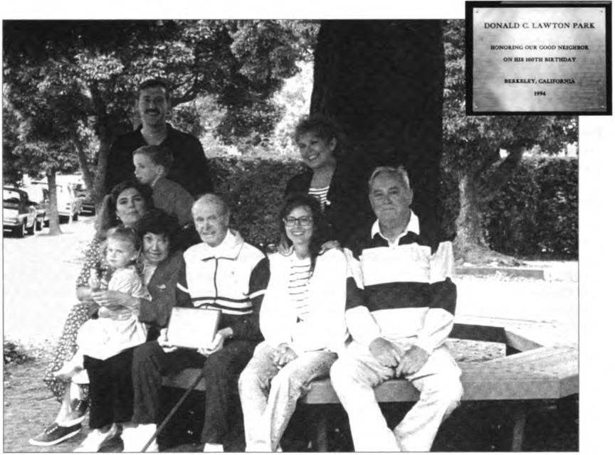 Across from Don and Billie's home at Parkside and Plaza Drive is a small plot of land, home to a redwood tree. To honor Don on his 100th birthday, neighbors worked to landscape the area build a handsome octagonal bench around the tree, and create a bronze plaque honoring him. Don and a large portion of his family give the bench its first test.