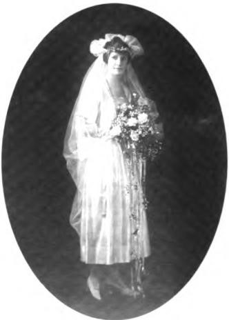 Dorothy in her beautifully designed wedding appar¬el, all in the style of the 1920s. August 1920.