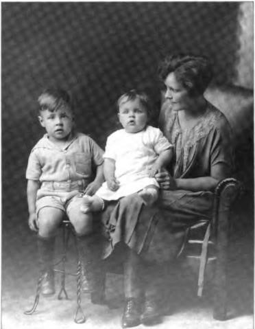 Helen. with her second son, Ed, and daughter. Marilyn, circa June 1925.